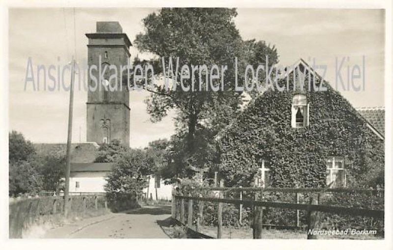 Ansichtskarte Borkum Ortsstraße mit altem Leuchtturm